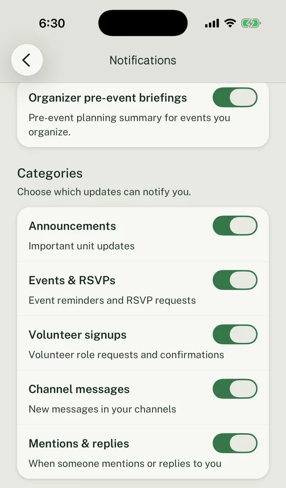 Woggle Notifications screen with Announcements, Events and RSVPs, Organizer pre-event briefings, Volunteer signups, Channel messages, and Mentions and replies enabled.