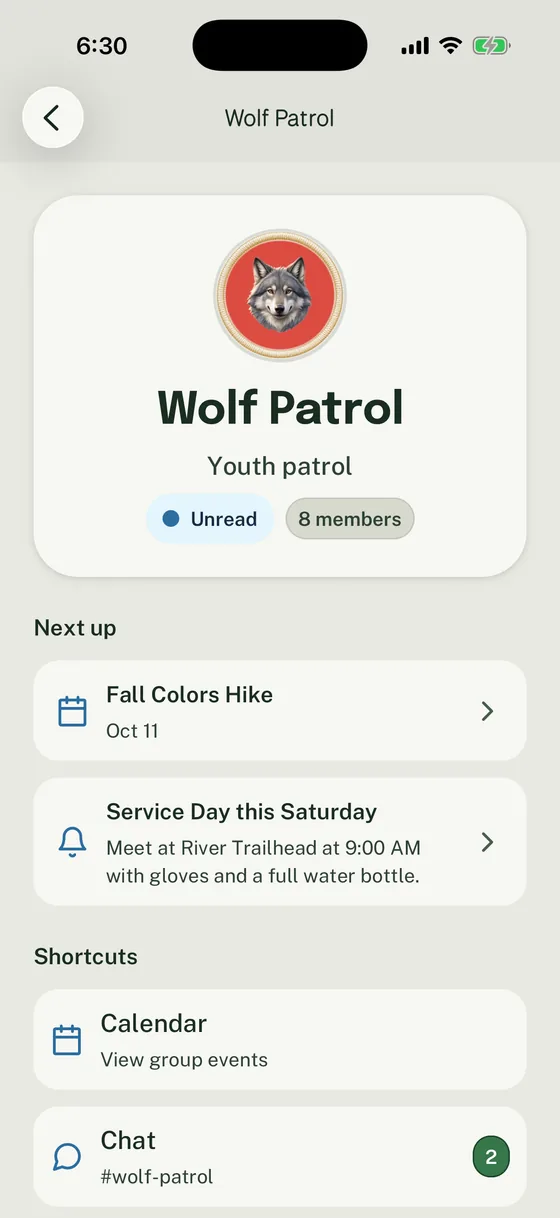 Woggle Wolf Patrol Group detail screen showing 8 members, next Event and Announcement, Calendar, and Chat shortcuts.