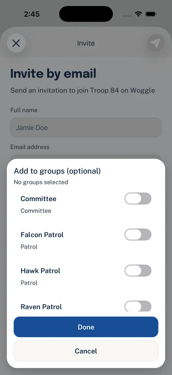 Woggle Invite screen showing optional Group assignment for Committee, Falcon Patrol, Hawk Patrol, and Raven Patrol.